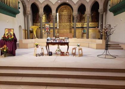 All Saints Table with photo of loved ones